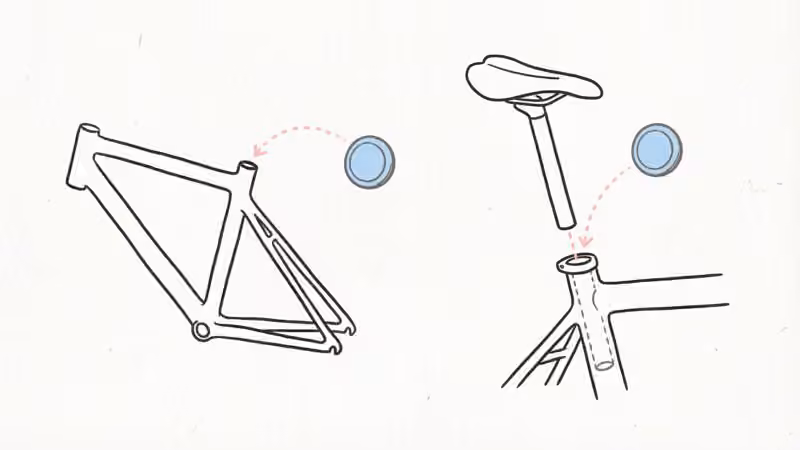 AirTag hidden inside a bicycle handlebar tube with foam padding for GPS bike tracking